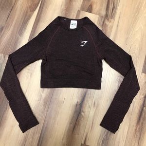 Gymshark long sleeve crop. Size xs, never worn.